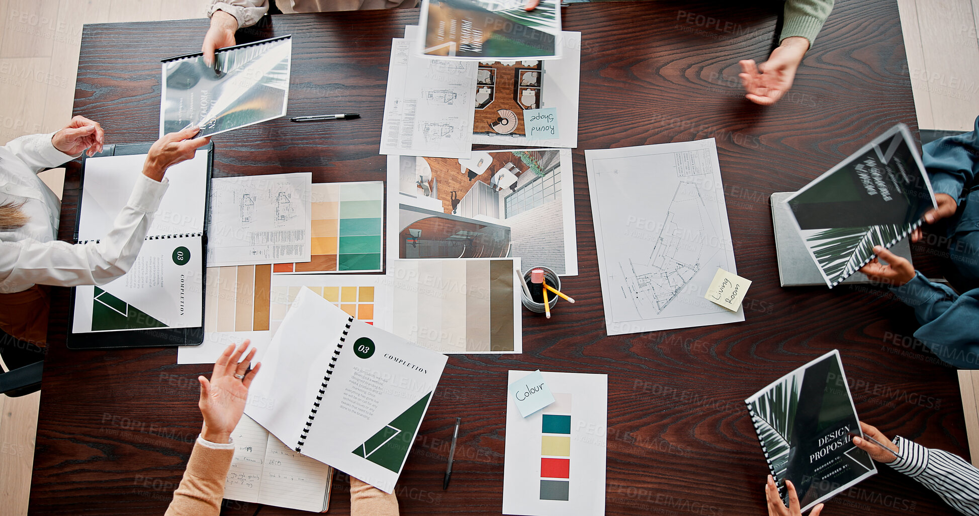 Buy stock photo Creative, documents and above of business people in meeting for project ideas, research and discussion. Design agency, office and workers with paperwork for teamwork, collaboration and brand strategy
