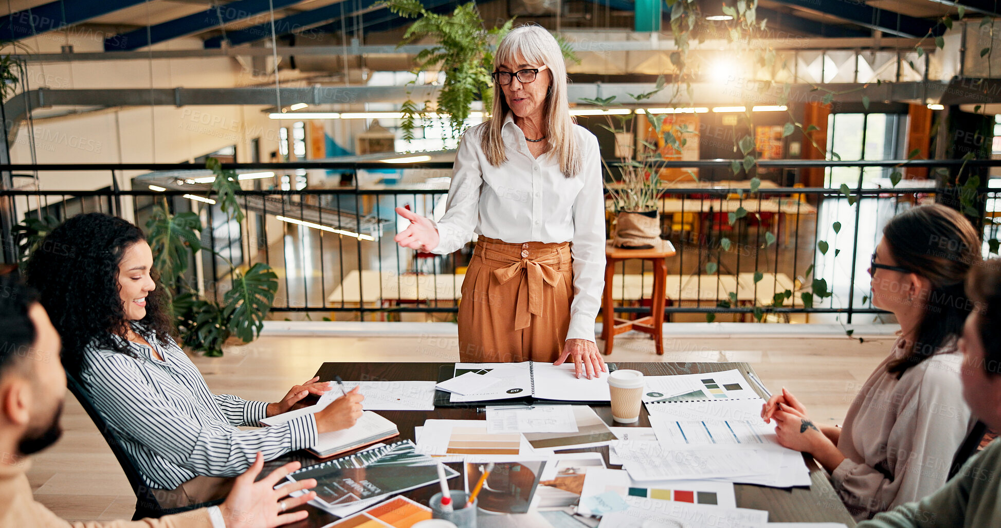 Buy stock photo Presentation, manager and business people in office with documents for planning creative project. Feedback, meeting and team of magazine editors in discussion with paperwork review for publishing.