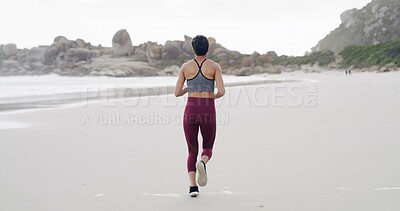 Buy stock photo Back of woman, workout and run on beach for exercise, fitness or outdoor wellness. Female person, athlete or runner with marathon, preparation and cardio training with space in nature for health