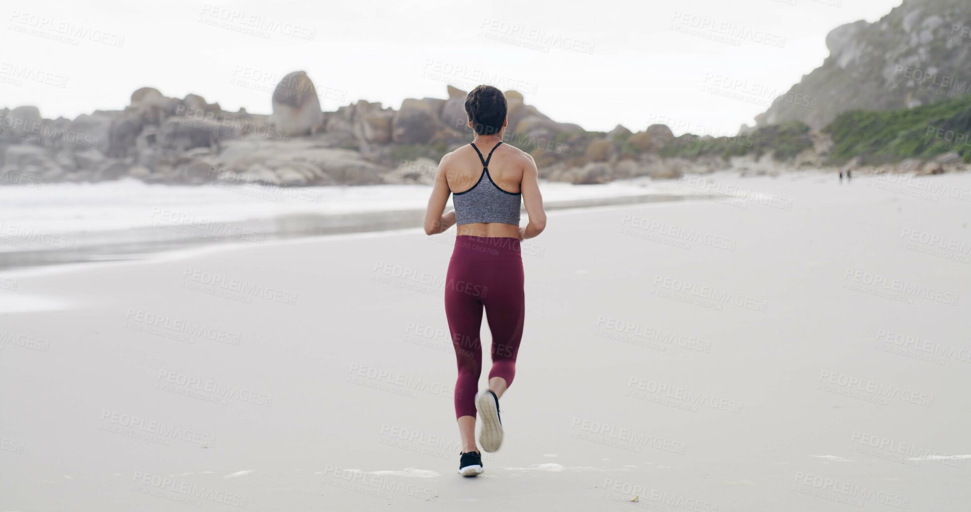 Buy stock photo Back of woman, workout and run on beach for exercise, fitness or outdoor wellness. Female person, athlete or runner with marathon, preparation and cardio training with space in nature for health