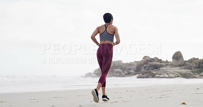 Buy stock photo Back of woman, workout and run on beach for fitness, exercise or outdoor wellness. Female person, athlete or runner with marathon, preparation and cardio training with space in nature for health