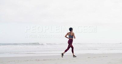 Buy stock photo Woman, running and back at beach, fitness and training with space, sky and outdoor with routine. Person, workout and exercise for wellness, cardio challenge and jog by ocean for health in New Zealand