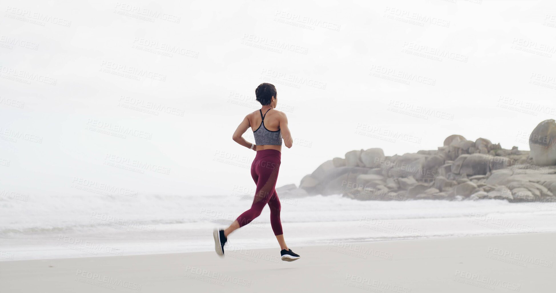 Buy stock photo Woman, running and workout at beach, back or training with space, sky and outdoor for routine. Person, exercise and fitness in summer for wellness, cardio challenge and jog by ocean in Australia