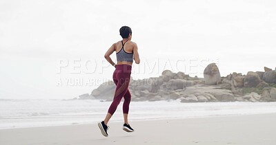Buy stock photo Woman, running and exercise at beach, back or training with space, sky and outdoor for routine. Person, workout and fitness in summer for wellness, cardio challenge and jog by ocean in Australia