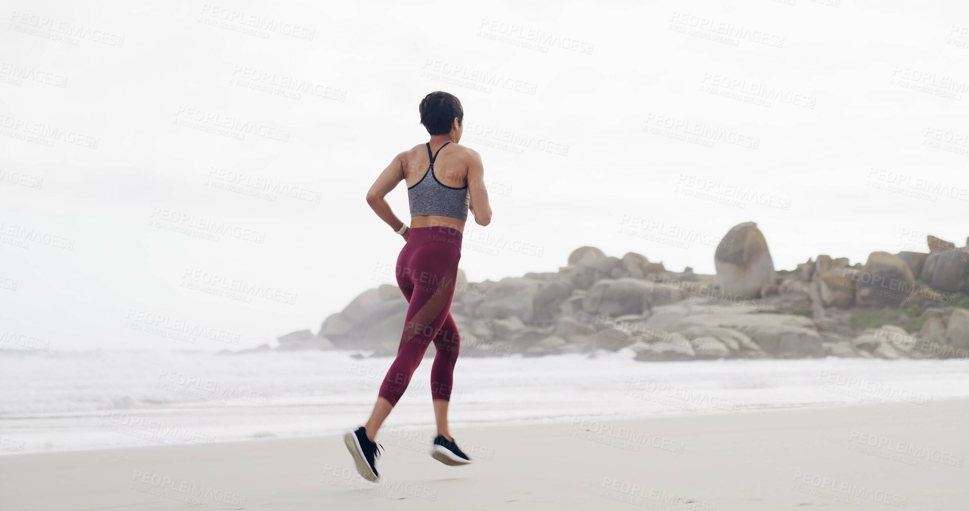 Buy stock photo Woman, running and exercise at beach, back or training with space, sky and outdoor for routine. Person, workout and fitness in summer for wellness, cardio challenge and jog by ocean in Australia