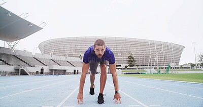 Buy stock photo Man, portrait or runner with start on stadium track for sprint, race or training lap. Active, male person or athlete getting ready to begin exercise for sport competition, distance running or fitness