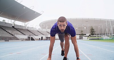 Buy stock photo Man, runner and challenge with start line on stadium track for sprint, race or training lap. Active, male person or athlete getting ready to begin for sport competition, distance running or fitness