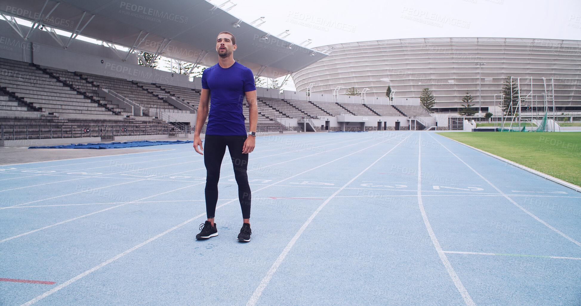 Buy stock photo Runner, thinking and finish with man on race track for fitness, cardio challenge and marathon practice. Workout, competition training and reflection with person in sports stadium for exercise