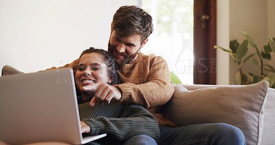 Buy stock photo Browsing, online and couple with laptop, home or watching movies with subscription on app and relax. Happy, man and woman with tech for entertainment, comfortable and bonding with film in lounge