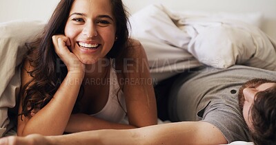 Buy stock photo Happy woman, relax and wake up with bed in home for morning, comfort or peaceful holiday. Portrait, female person or lying awake with man asleep in bedroom for rest, nap or weekend together in house