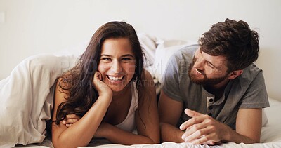Buy stock photo Couple, portrait in bed and relax with happiness, moment and connection for bonding in home. Woman, man and laugh with romance, marriage and rest with commitment, trust and comfort in bedroom