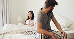 Frustrated couple, fight and argument with stress in bed for breakup, conflict or disagreement. Upset man, woman or toxic relationship with dispute in bedroom for divorce or cheating affair in home