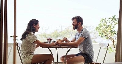 Buy stock photo Breakfast, funny and holding hands with couple on balcony of home together for bonding. Laughing, love and morning with happy people outdoor at apartment for anniversary, honeymoon or romance