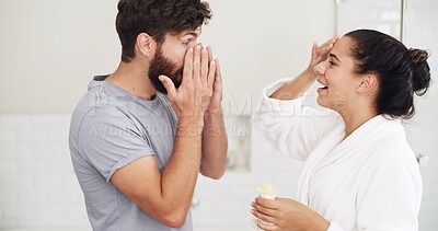 Buy stock photo Skincare, cream and love with couple in bathroom for beauty, support and sunscreen protection. Cosmetics, bonding and dermatology with man and woman in home for uv lotion, glow and spf product