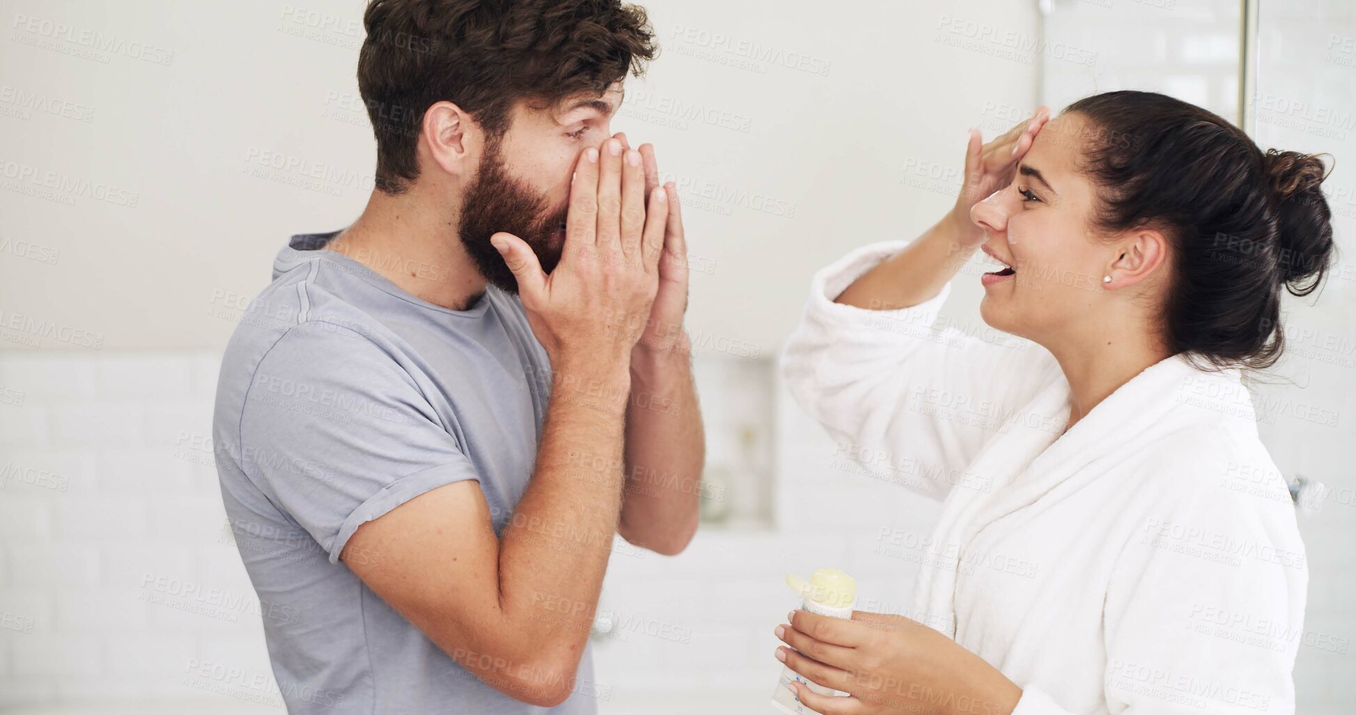 Buy stock photo Skincare, cream and love with couple in bathroom for beauty, support and sunscreen protection. Cosmetics, bonding and dermatology with man and woman in home for uv lotion, glow and spf product