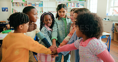 Buy stock photo Stack of hands, celebration and kids in classroom for support, learning or education. Motivation, teamwork and group of students with growth, friendship or childhood development at elementary school.