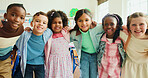 Education, portrait and students or friends in classroom together for learning, growth or development. Embrace, smile and happy children in back to school class for knowledge, hug and academics