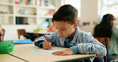 Buy stock photo Learning, students and kid writing in classroom for education, math or problem solving. Scholarship, boy and assessment at elementary school for numeracy knowledge, academic assignment or test