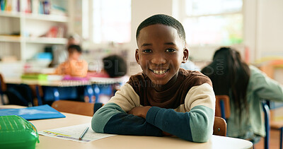 Buy stock photo Boy, child and portrait in classroom with arms crossed, smile and confidence for learning at academy. Kid, happy learner and pupil for education, face or development with pride at elementary school