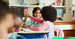 Children, smile and high five in classroom for success, education and teamwork. Happy girls, students and hands together for celebration with friends for learning, support or pass test in school