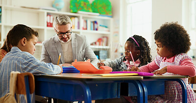 Buy stock photo Classroom, teacher and man with children, writing or helping students with assignment and education. Learning, kids and educator with curriculum for knowledge, growth and development in elementary