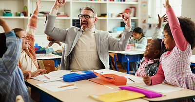 Buy stock photo Success, education and teacher with kids in classroom for learning, support and assessment group. Celebration, child development and achievement with students and man in school for scholarship news