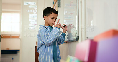 Buy stock photo Math, child and counting on whiteboard, classroom and problem solving with calculation and knowledge. Education, writing and kid with skill development in elementary, growth and learning in school