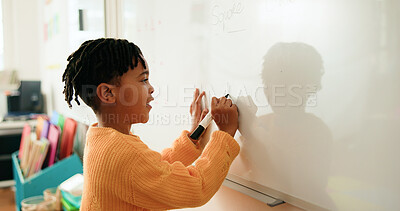 Buy stock photo Whiteboard, education and boy in classroom for learning math, problem solving or knowledge. Elementary school, kid and child student writing for growth, development or presentation at academy.