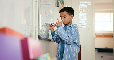 Buy stock photo Math, child and writing on whiteboard, classroom and problem solving with calculation and knowledge. Education, counting and kid with skill development in elementary, growth and learning in school