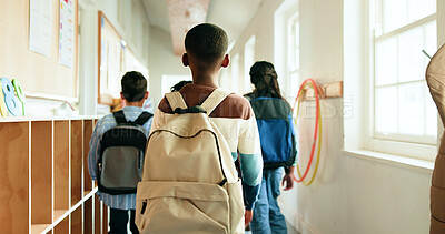 Buy stock photo Back, children and students with backpack in lobby at preschool, education and lunch break. Boy, kids and walking to classroom for learning, group studying and scholarship for knowledge growth