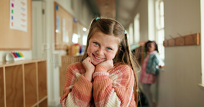 Buy stock photo Portrait, smile and girl with confidence at school for education, learning and scholarship. Happy, child and students in hallway for study opportunity, knowledge growth and satisfaction for academic
