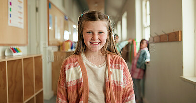 Buy stock photo Girl, portrait and smile in hallway for education, learning opportunity and back to school. Child, positivity and happy at montessori for development, growth and knowledge or academic scholarship