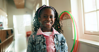 Buy stock photo Black child, portrait and happy in hallway for education, learning opportunity or back to school. Kid, excited or knowledge at montessori for development, growth and academic scholarship in Nigeria