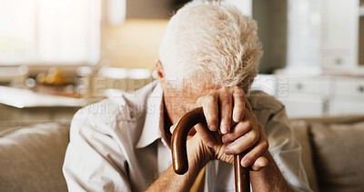 Buy stock photo Senior, sad man and thinking with cane on sofa for memory, nostalgia or regret in retirement home. Elderly, male person or contemplating with walking stick, aid or doubt on couch for past in house
