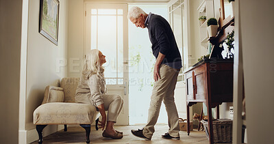 Buy stock photo Assistance, conversation and retirement with senior couple in entrance hall of home for help. Getting ready, morning and shoes with old people in apartment together for daily routine or preparation
