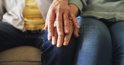 Buy stock photo Love, senior couple and holding hands in home for retirement support, bonding together or security. Pensioner, elderly people and affection on sofa for appreciation, marriage commitment or connection