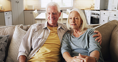 Buy stock photo Elderly couple, relax and watching tv on sofa in home with bonding together, streaming show or love. Happy, senior people and hug in house with news broadcast, weekend break and retirement security