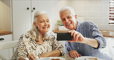 Buy stock photo Selfie, old couple and bonding with breakfast, kitchen and smile for memory on social media and app. Happy, senior man and profile picture with elderly woman, photography and people with food in home