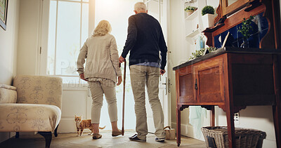 Buy stock photo Back, retirement or senior couple at house by door, health benefit or exercise in morning walk. Balance, joint flexibility or old people stroll together for fresh air, wellness or movement with cat