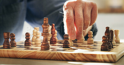 Buy stock photo Senior person, hands and playing with chess board in retirement home for strategy game. Closeup, elderly or king with move or piece for critical thinking, memory development or cognitive skill