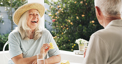 Buy stock photo Retirement, laughing and old couple with fruit, outdoor or humor for conversation, love and weekend. Happy, senior woman and elderly man with pineapple on date, people and funny joke at home or patio