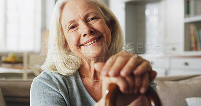 Buy stock photo Smile, walking stick and portrait of senior woman in home with relax, peace and medical support. Happy, mobility aid and elderly person with disability, parkinson or arthritis on sofa in house.
