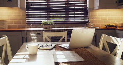 Buy stock photo Coffee, documents and laptop on wooden table in kitchen for remote work, research or study online. Computer, notebook and still life interior with cup in empty apartment for start of morning routine