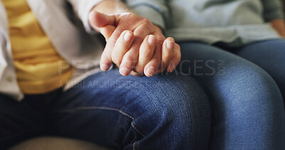 Buy stock photo Love, senior couple and holding hands on sofa for retirement support, bonding together and loyalty. Pensioner, elderly people and affection in house for romance, marriage commitment and connection