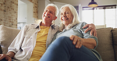 Buy stock photo Senior couple, hug and watching tv on sofa with bonding together, streaming subscription or series. Happy, elderly people and relax in house with online movie, weekend break and retirement support