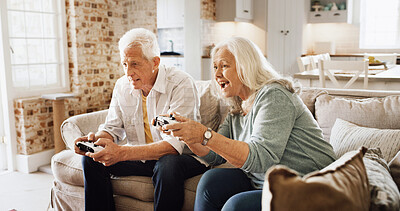 Buy stock photo Home, video games and senior couple on sofa, bonding together and relax in lounge. Apartment, esports and man with woman, entertainment and  competition with hobby, fun and gaming with controller