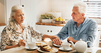 Buy stock photo Cake, holding hands and senior couple in home with bonding together for dessert with tea. Talking, support and elderly man with woman in retirement for eating treat with coffee in kitchen in house.
