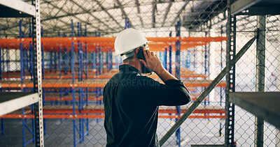 Buy stock photo Phone call, construction worker and man at warehouse for storage, supply chain or logistics. Mobile, shipping and engineer with conversation for export, maintenance or industrial inspection with back