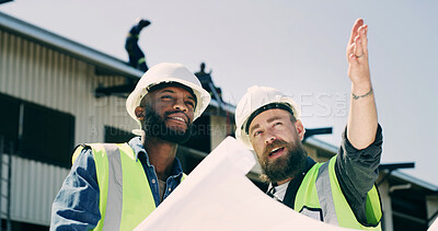 Buy stock photo Men, engineer and blueprint with planning at construction site for review, inspection and point for advice. People, team and architect with talk, floor plan and low angle for real estate development