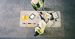 Business people, handshake or architect with project above for construction planning or agreement. Top view, contractor or builder shaking hands with documents, blueprint or mockup tablet for startup